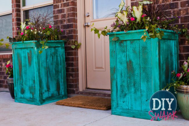 Different styles and sizes of DIY cedar planters.