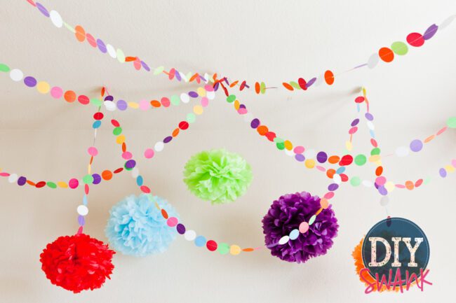 A tutorial on making DIY paper garland. Super easy, inexpensive decor idea for parties, baby showers or holidays!